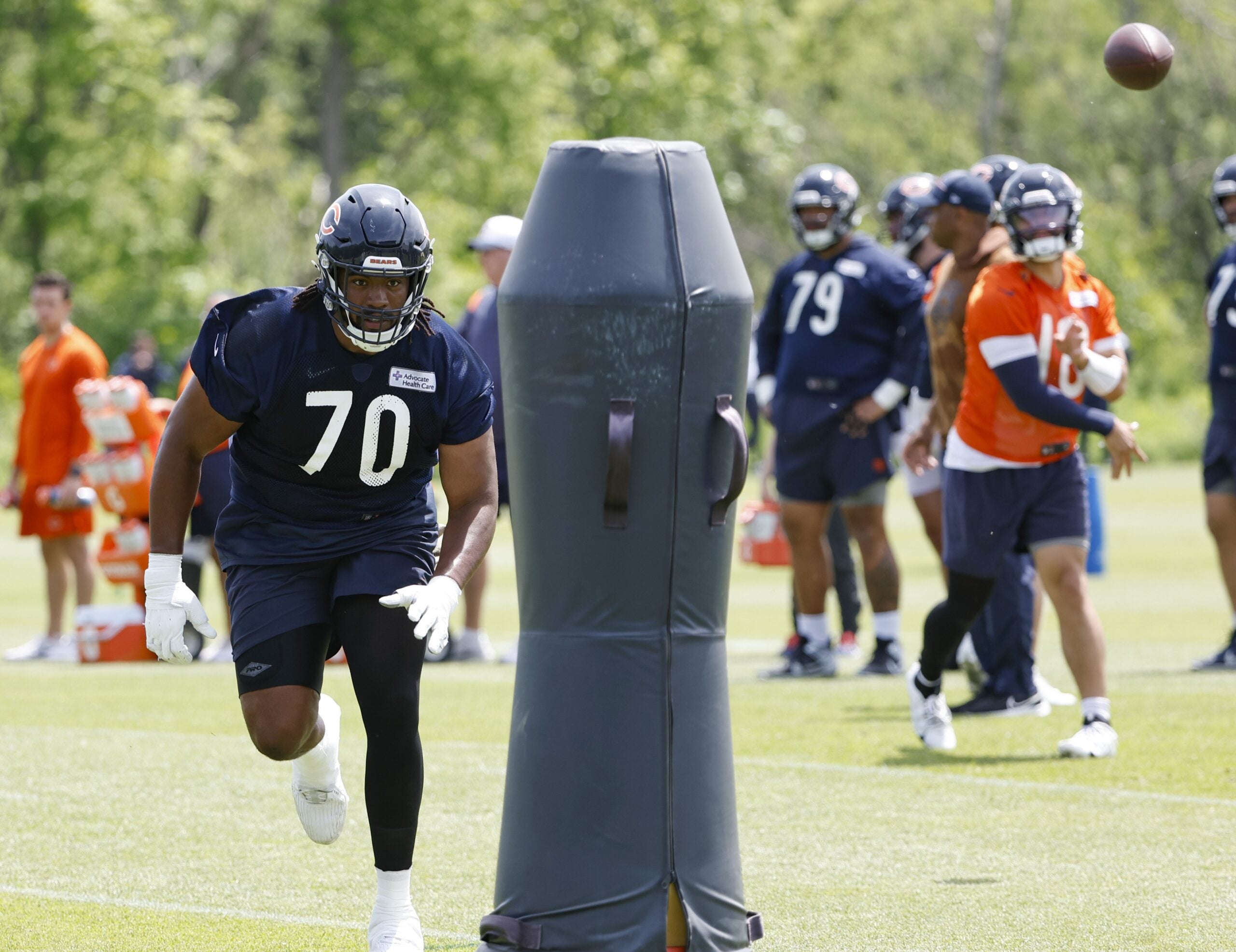 May 31, 2024; Lake Forest, IL, USA; Chicago Bears offensive tackle Braxton Jones (70) runs during organized team activities at Halas Hall.