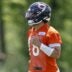 May 31, 2024; Lake Forest, IL, USA; Chicago Bears quarterback Caleb Williams (18) runs on the field during organized team activities at Halas Hall.