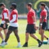 Jul 27, 2024; Florham Park, NJ, USA; New York Jets quarterback Aaron Rodgers (8) and quarterback Tyrod Taylor (2) walk across the field with teammates during training camp at Atlantic Health Jets Training Center.