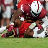 Oklahoma Sooners defensive lineman Gracen Halton (56) sacks Houston Cougars quarterback Donovan Smith (1) during a college football game between the University of Oklahoma Sooners (OU) and the Houston Cougars at Gaylord Family – Oklahoma Memorial Stadium in Norman, Okla., Saturday, Sept. 7, 2024.