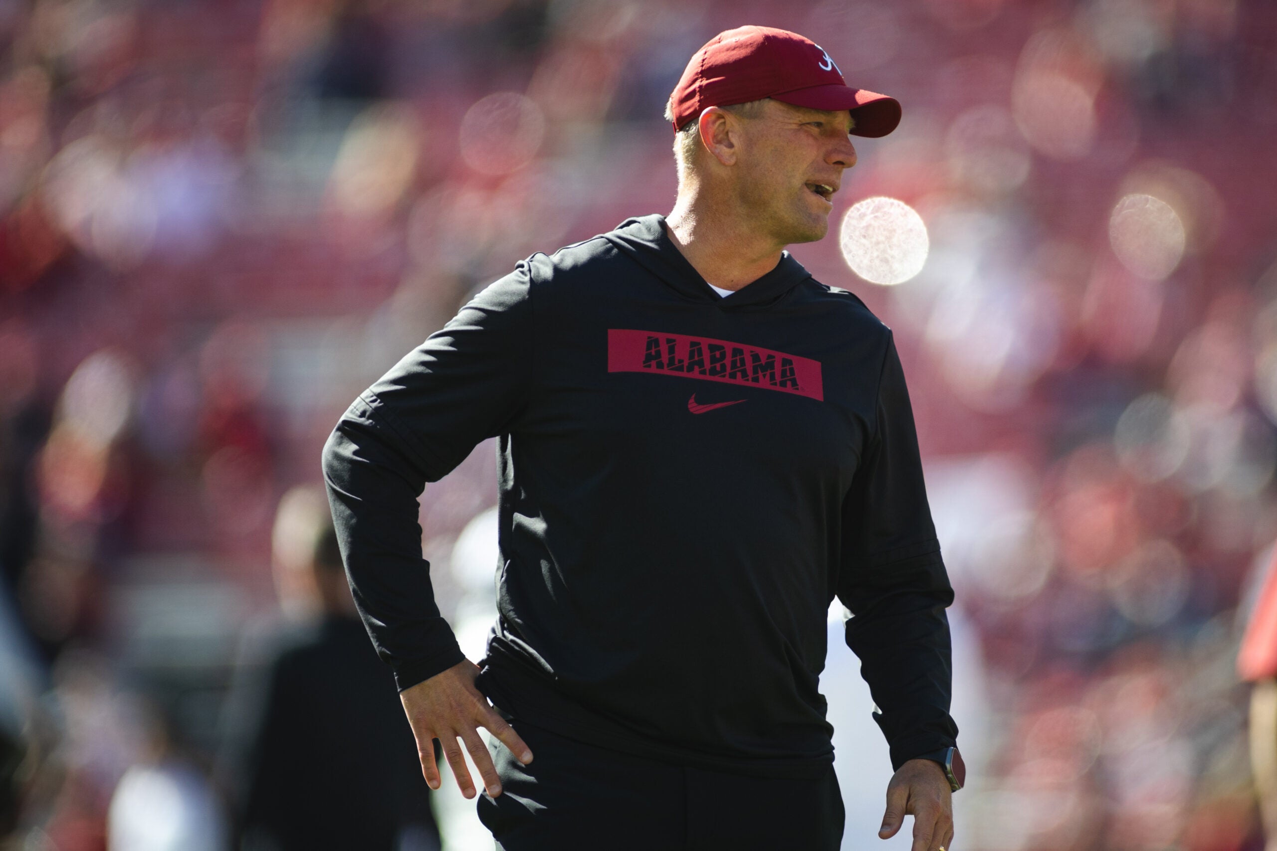Nov 16, 2024; Tuscaloosa, Alabama, USA; Alabama Crimson Tide head coach Kalen DeBoer watches warmups prior to a game against Mercer Bears at Bryant-Denny Stadium.