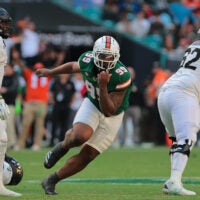 Nov 23, 2024; Miami Gardens, Florida, USA; Miami Hurricanes defensive lineman Ahmad Moten Sr. (99) reacts after sacking Wake Forest Demon Deacons quarterback Hank Bachmeier (not pictured) during the third quarter at Hard Rock Stadium.
