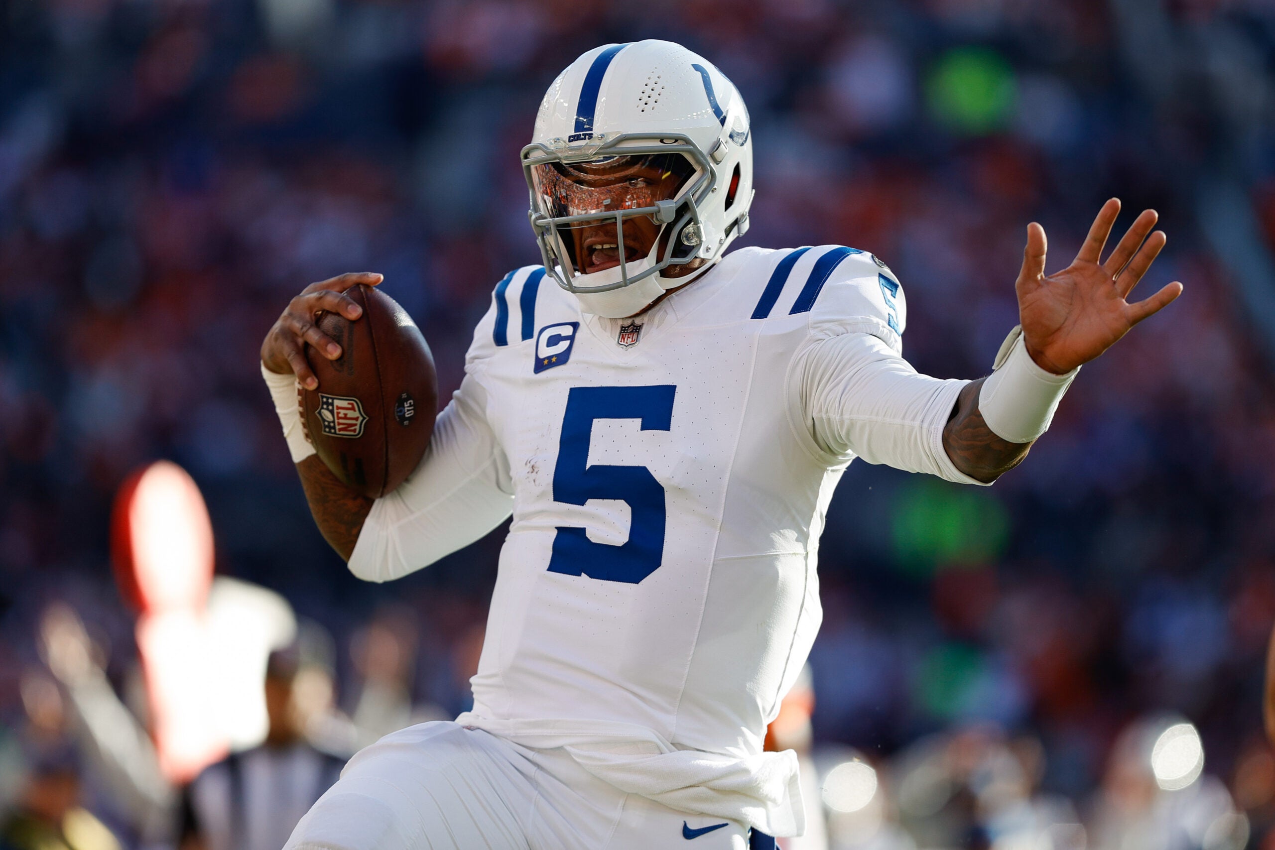Dec 15, 2024; Denver, Colorado, USA; Indianapolis Colts quarterback Anthony Richardson (5) runs for a touchdown in the first quarter against the Denver Broncos at Empower Field at Mile High.