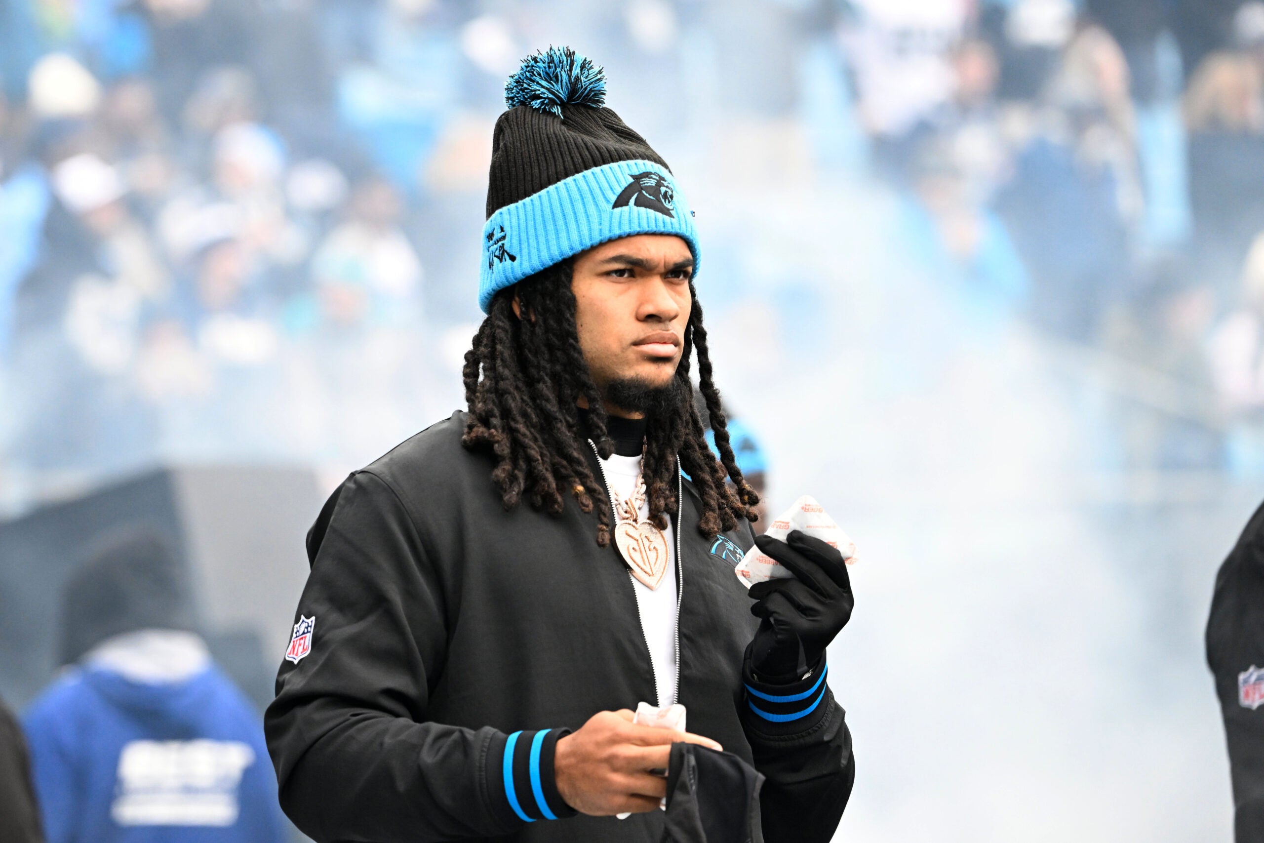 Dec 15, 2024; Charlotte, North Carolina, USA; Carolina Panthers running back Jonathon Brooks (24) walk on to the field before the game at Bank of America Stadium.