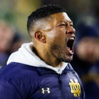 Notre Dame head coach Marcus Freeman celebrates after winning the first round of the College Football Playoff 27-17 against Indiana at Notre Dame Stadium on Friday, Dec. 20, 2024, in South Bend.