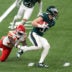 Feb 9, 2025; New Orleans, LA, USA; Philadelphia Eagles cornerback Cooper DeJean (33) returns a punt against Kansas City Chiefs safety Nazeeh Johnson (13) during the second quarter in Super Bowl LIX at Caesars Superdome.