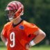 Cincinnati Bengals quarterback Joe Burrow (9) looks on between plays during a session of organized team activities on the Bengals practice field at Paycor Stadium in downtown Cincinnati on Tuesday, June 3, 2025.