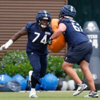 Jun 3, 2025; Lake Forest, IL, USA; Chicago Bears guard Jordan McFadden (74) warms up during minicamp at Halas Hall.