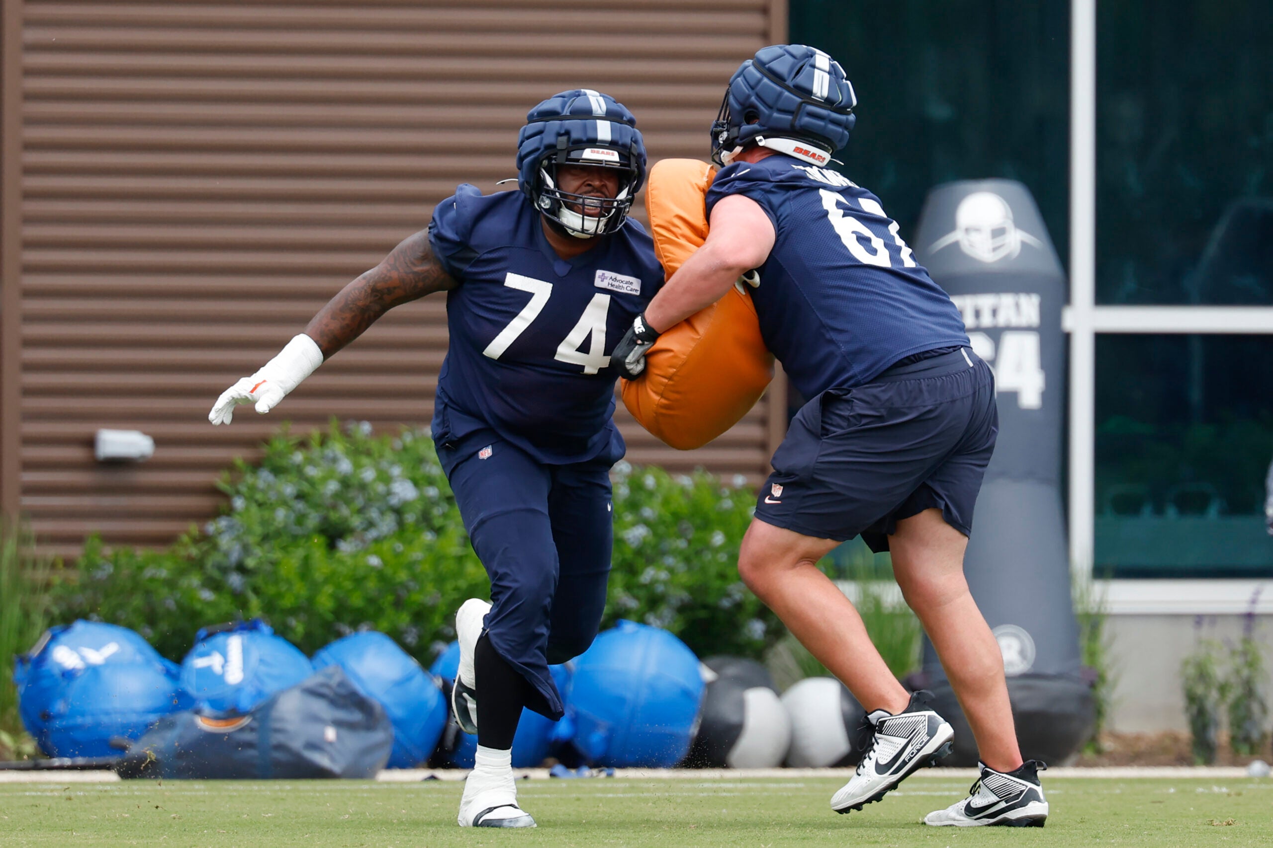 Jun 3, 2025; Lake Forest, IL, USA; Chicago Bears guard Jordan McFadden (74) warms up during minicamp at Halas Hall.