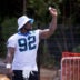 Jul 24, 2025; Charlotte, NC, USA; Carolina Panthers defensive tackle Tershawn Wharton (92) plays around as he waits to be interviewed during training camp.