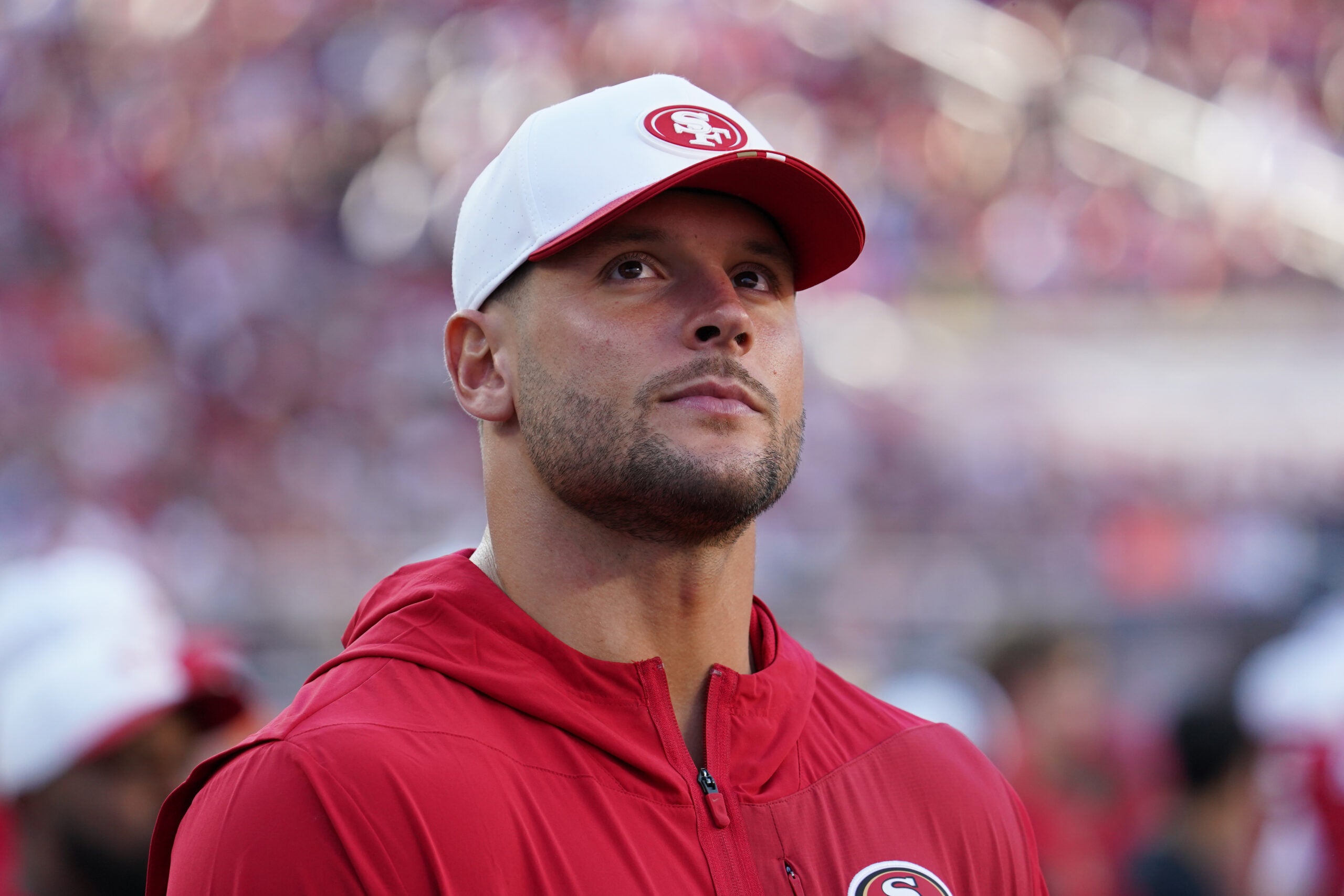 Aug 9, 2025; Santa Clara, California, USA; San Francisco 49ers defensive lineman Nick Bosa (97) watches from the sidelines in the first quarter against the Denver Broncos at Levi's Stadium.
