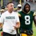 Aug 9, 2025; Green Bay, Wisconsin, USA; Green Bay Packers head coach Matt LaFleur, left, and running back Josh Jacobs (8) walk off the field following a 30-10 loss against the New York Jets at Lambeau Field.