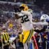 Green Bay Packers running back MarShawn Lloyd (32) and Indianapolis Colts cornerback Chris Lammons (38) miss a long pass on Saturday, Aug. 16, 2025, during a game against the Green Bay Packers at Lucas Oil Stadium in Indianapolis.