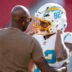 August 23, 2025; Santa Clara, California, USA; Los Angeles Chargers wide receiver Brenden Rice (82) hugs father San Francisco 49ers great Jerry Rice (left) before the game at Levi's Stadium.