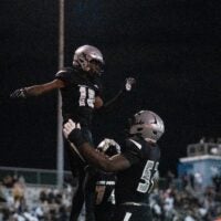 St. Peter Prep's Amari Jones (10) celebrates with his teammate Olubobola Oluwasemilore (52) during a high school football game between St. Peter’s Prep and Paramus Catholic in Jersey City on Friday, Aug. 29, 2025.