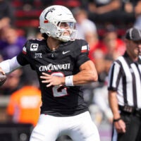 Sep 13, 2025; Cincinnati, Ohio, USA; Cincinnati Bearcats quarterback Brendan Sorsby (2) throws a pass for a touchdown against the Northwestern State Demons in the first half at Nippert Stadium.
