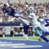 Sep 14, 2025; Arlington, Texas, USA; New York Giants wide receiver Malik Nabers (1) makes a catch for a touchdown against Dallas Cowboys cornerback Trevon Diggs (7) during the second quarter at AT&T Stadium.