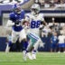 Sep 14, 2025; Arlington, Texas, USA; Dallas Cowboys wide receiver CeeDee Lamb (88) runs with the ball against the New York Giants during the second quarter at AT&T Stadium.