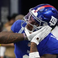 Sep 14, 2025; Arlington, Texas, USA; New York Giants wide receiver Malik Nabers (1) reacts after scoring a touchdown during the fourth quarter at AT&T Stadium.