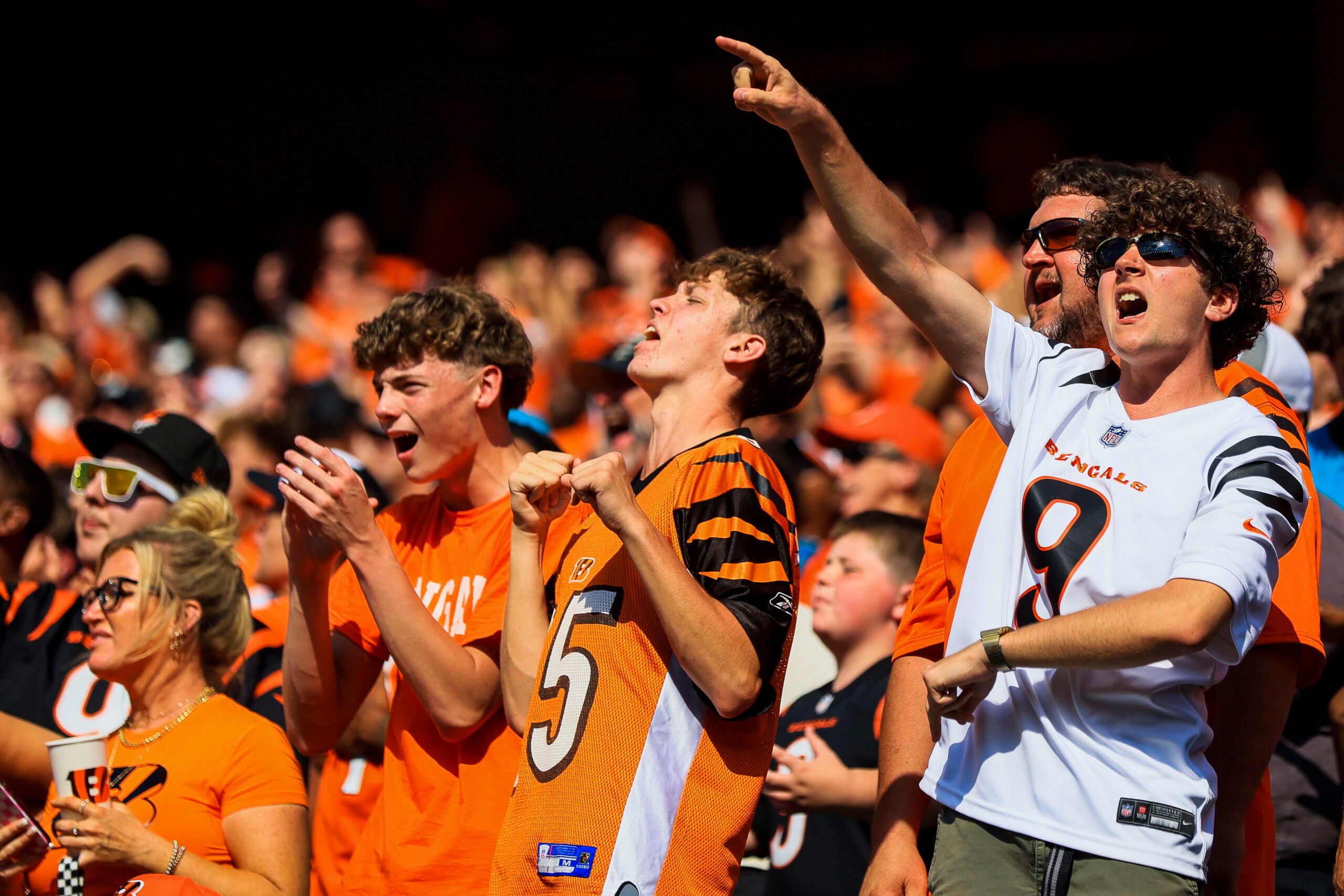 Sep 14, 2025; Cincinnati, Ohio, USA; Cincinnati Bengals fans cheer during the second half against the Jacksonville Jaguars at Paycor Stadium.