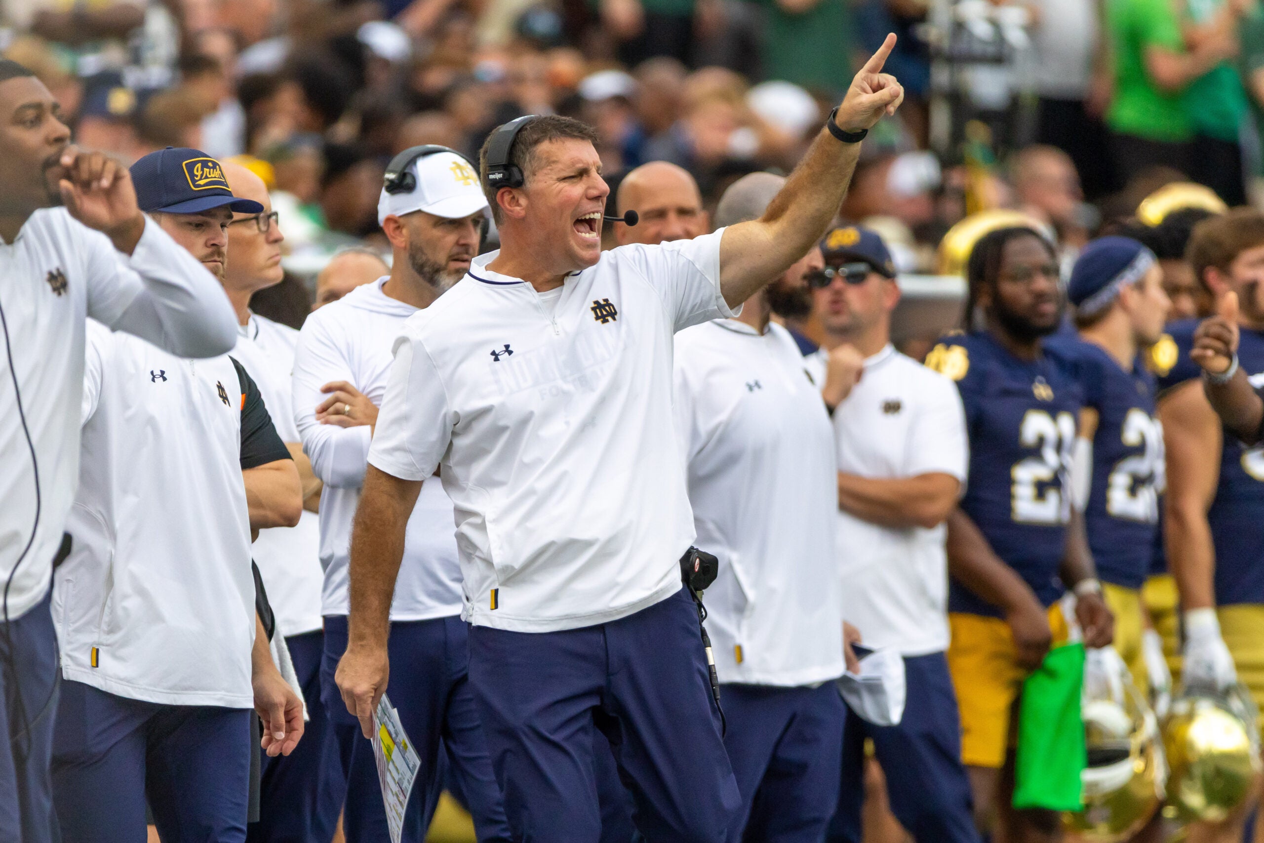 Sep 20, 2025; South Bend, Indiana, USA; Notre Dame Fighting Irish defensive coordinator Chris Ash shouts towards the field against the Purdue Boilermakers during the first half at Notre Dame Stadium.