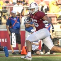 Sep 27, 2025; Stanford, California, USA; Stanford Cardinal tight end Sam Roush (86) runs for a touchdown during the second quarter against San Jose State Spartans safety Larry Turner-Gooden (3) at Stanford Stadium.