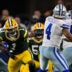 Sep 28, 2025; Arlington, Texas, USA; Green Bay Packers defensive end Micah Parsons (1) rushes against Dallas Cowboys quarterback Dak Prescott (4) during the game between the Dallas Cowboys and the Green Bay Packers at AT&T Stadium.