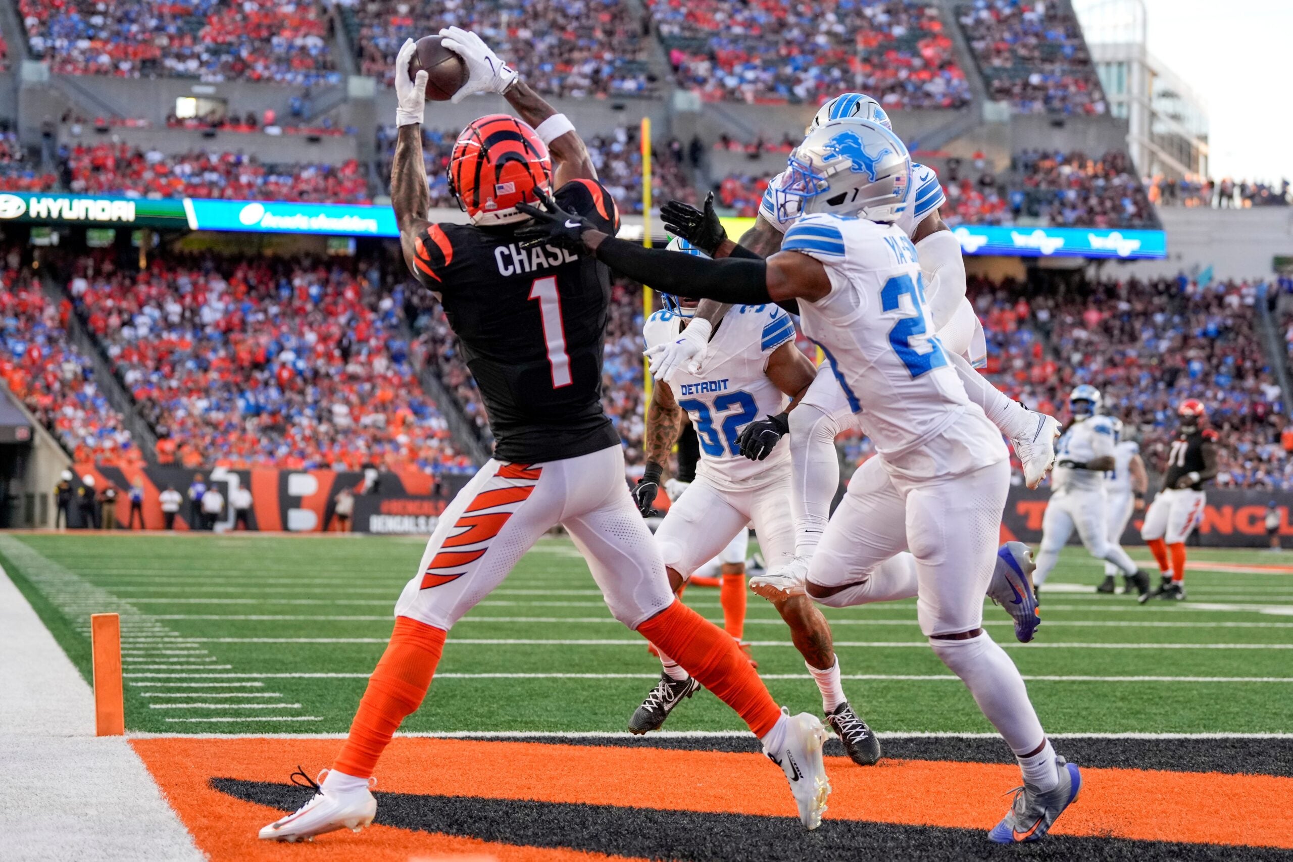 Cincinnati Bengals wide receiver Ja'Marr Chase (1) catches a pass for a touchdown in the fourth quarter of the NFL Week 5 game between the Cincinnati Bengals and the Detroit Lions at Paycor Stadium in downtown Cincinnati on Sunday, Oct. 5, 2025. The Bengals continued a losing streak, falling 37-24 to the Lions.