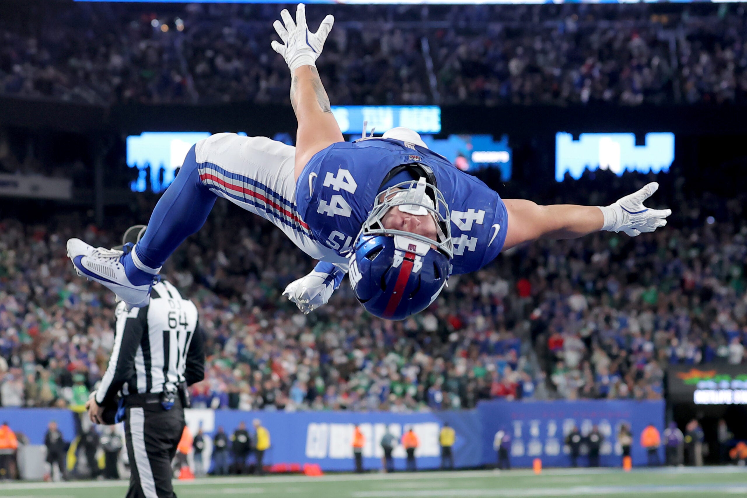 Oct 9, 2025; East Rutherford, New Jersey, USA; New York Giants running back Cam Skattebo (44) celebrates his touchdown against the Philadelphia Eagles during the fourth quarter at MetLife Stadium.