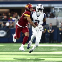 Oct 19, 2025; Arlington, Texas, USA; Dallas Cowboys wide receiver George Pickens (3) makes a reception defended by Washington Commanders cornerback Marshon Lattimore (2) during the second quarter of the game at AT&T Stadium.
