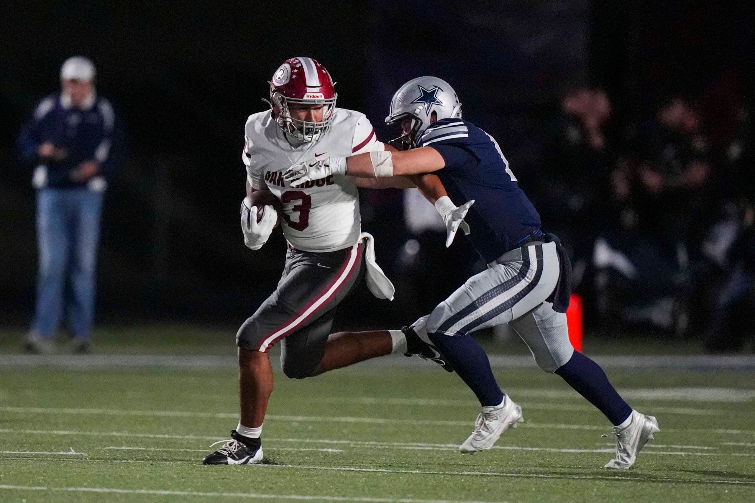 Farragut's Harrison Smith (1) tackles Oak Ridge's Malik Howard (3) during a TSSAA high school football game between Farragut and Oak Ridge High School on Oct. 23, 2025.