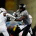 Nov 1, 2025; Boulder, Colorado, USA; Colorado Buffaloes offensive lineman Jordan Seaton (77) and Arizona Wildcats linebacker Chase Kennedy (7) during the second half at Folsom Field.
