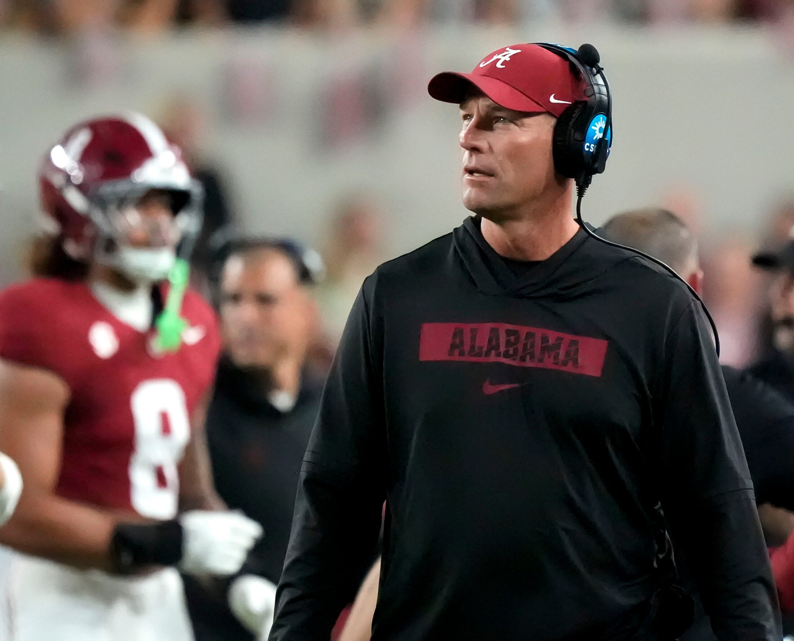 Nov 8, 2025; Tuscaloosa, Alabama, USA; Alabama head coach Kalen DeBoer walks the sidelines in his black hoodie during the game with LSU at Saban Field at Bryant-Denny Stadium.