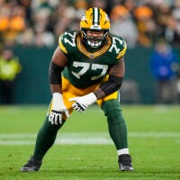 Nov 10, 2025; Green Bay, Wisconsin, USA; Green Bay Packers offensive tackle Jordan Morgan (77) during the game against the Philadelphia Eagles at Lambeau Field.