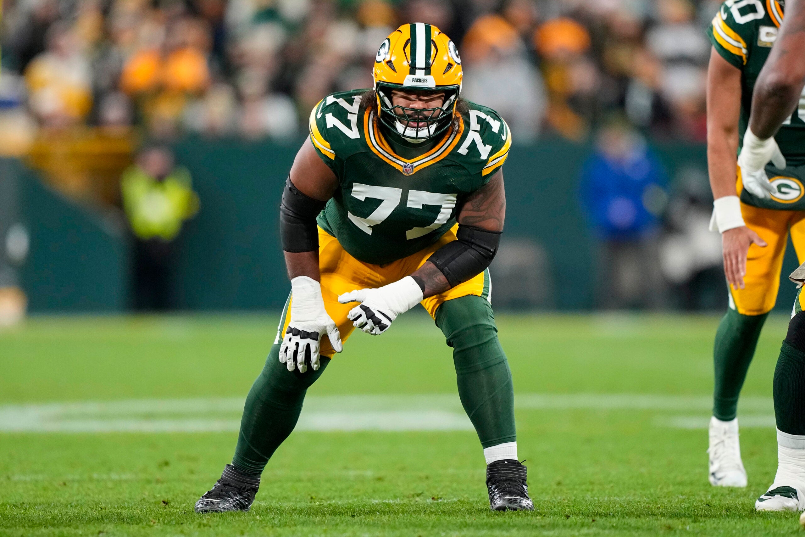 Nov 10, 2025; Green Bay, Wisconsin, USA; Green Bay Packers offensive tackle Jordan Morgan (77) during the game against the Philadelphia Eagles at Lambeau Field.
