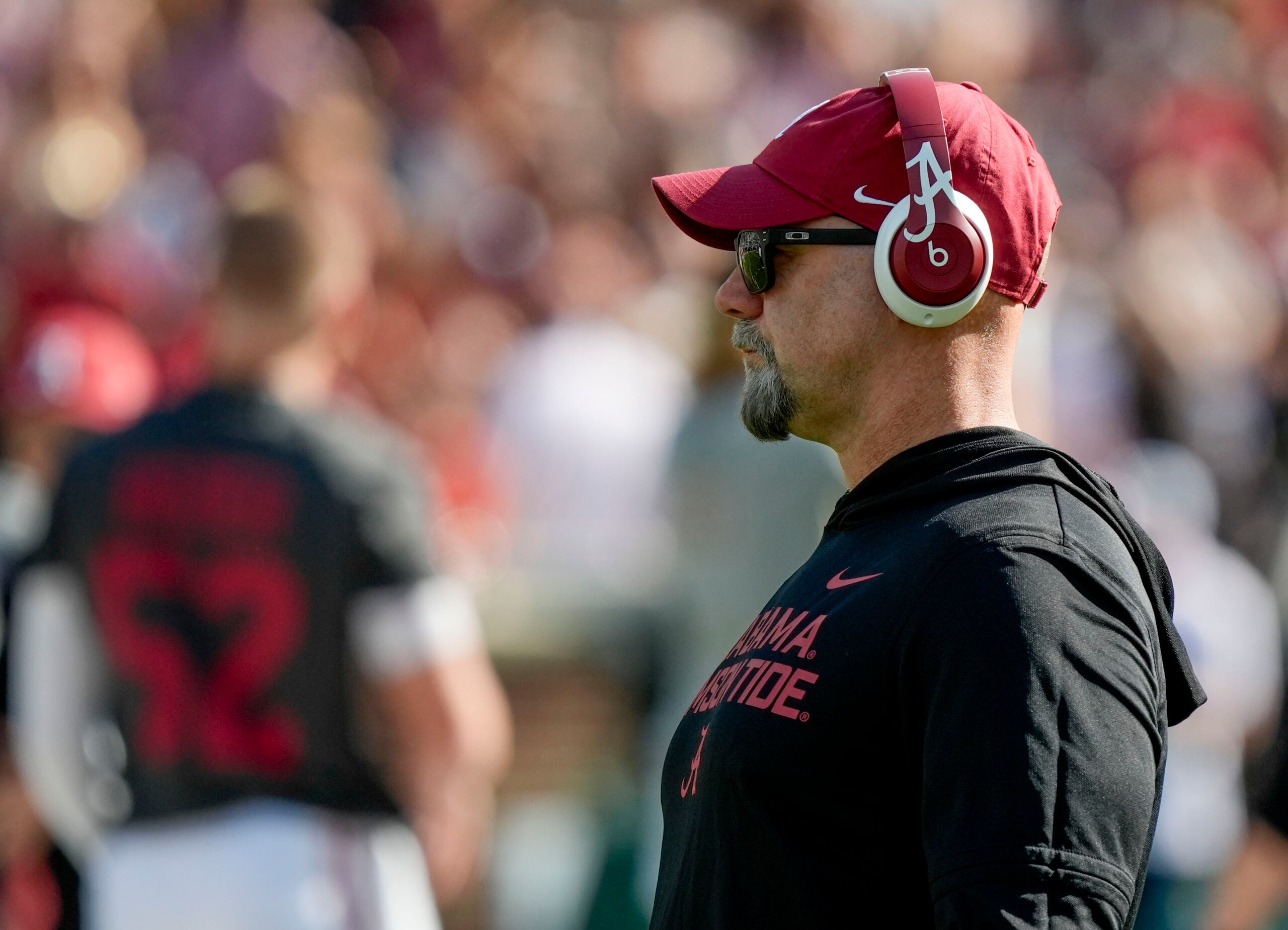 Nov 15, 2025; Tuscaloosa, Alabama, USA; Alabama offensive coordinator Ryan Grubb watches the Crimson Tide stretch before the game with Oklahoma at Saban Field at Bryant-Denny Stadium at Saban Field at Bryant-Denny Stadium.