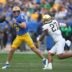 Pittsburgh Panthers quarterback Mason Heintschel (6) prepares to fire the ball downfield while being pressured by Notre Dame Fighting Irish linebacker Kyngstonn Viliamu-Asa (27) during the first half at Acrisure Stadium in Pittsburgh, PA on November 15, 2025.
