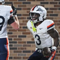 Nov 15, 2025; Durham, North Carolina, USA; Virginia Cavaliers running back J'Mari Taylor (3) celebrates after scoring a touchdown during the third quarter against the Duke Blue Devils at Wallace Wade Stadium.