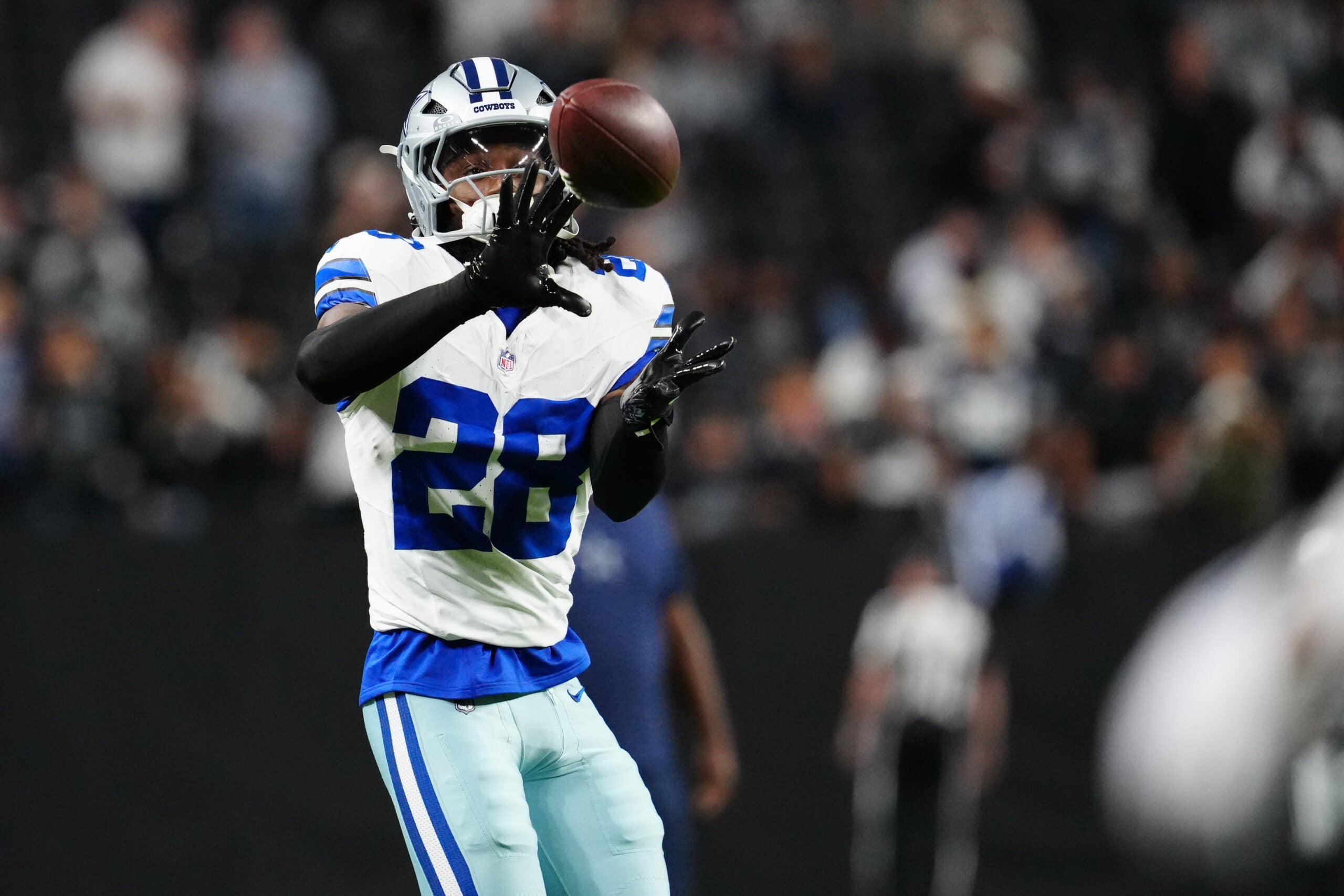 Nov 17, 2025; Paradise, Nevada, USA; Dallas Cowboys safety Malik Hooker (28) warms up prior to a game against the Las Vegas Raiders at Allegiant Stadium.