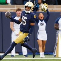 Notre Dame cornerback Leonard Moore returns an interception for a touchdown in the first half of a NCAA football game against Syracuse at Notre Dame Stadium on Saturday, Nov. 22, 2025, in South Bend.