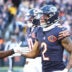Nov 23, 2025; Chicago, Illinois, USA; Chicago Bears wide receiver DJ Moore (2) reacts after making a touchdown catch against the Pittsburgh Steelers during the second half at Soldier Field.