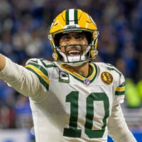 Nov 27, 2025; Detroit, Michigan, USA; Green Bay Packers quarterback Jordan Love (10) calls a play against the Detroit Lions during the second quarter at Ford Field.