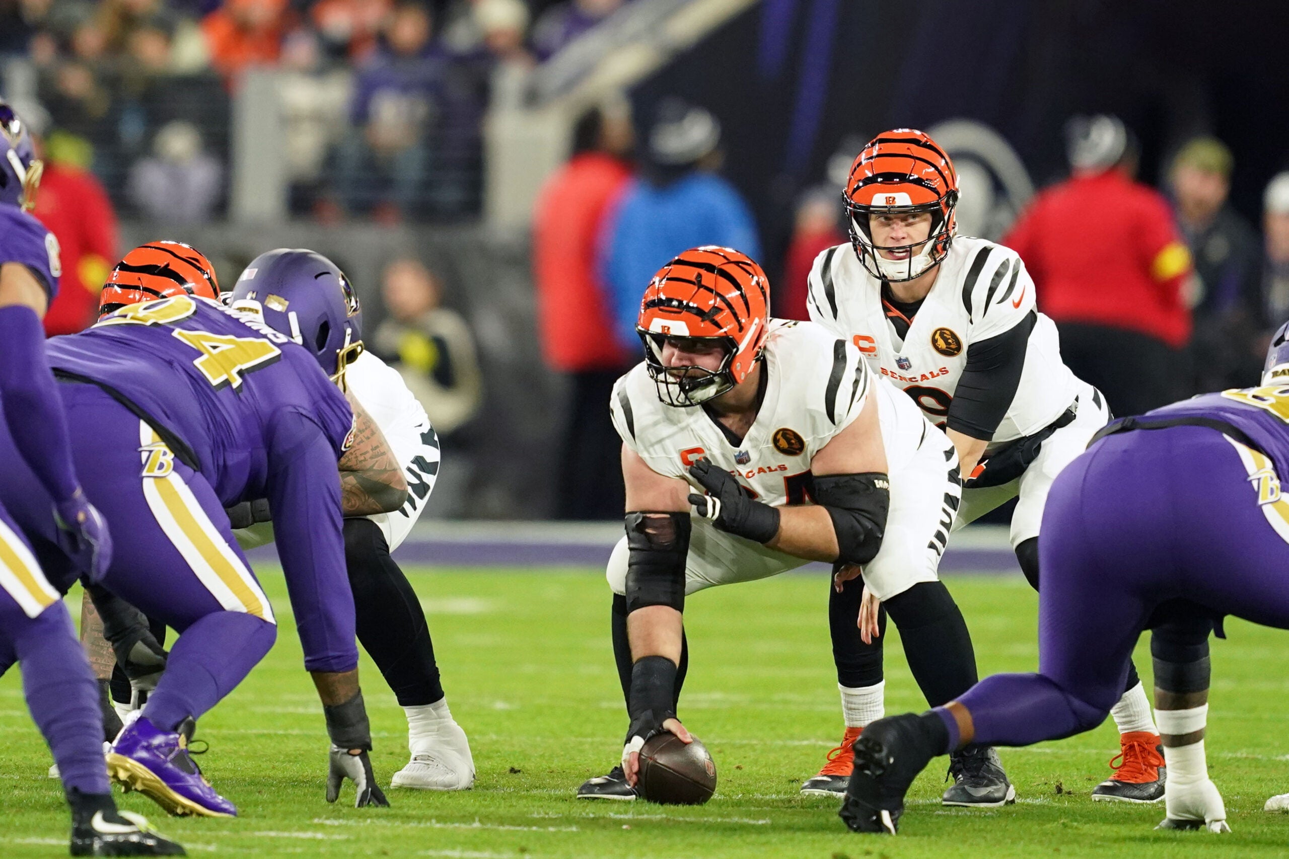 Nov 27, 2025; Baltimore, Maryland, USA; Cincinnati Bengals quarterback Joe Burrow (9) takes a snap against the Baltimore Ravens during the first half at M&T Bank Stadium.