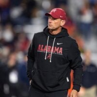 Alabama Crimson Tide head coach Kalen DeBoer watches on during warm ups before Auburn Tigers take on Alabama Crimson Tide at Jordan-Hare Stadium in Auburn, Ala. on Saturday, Nov. 29, 2025.