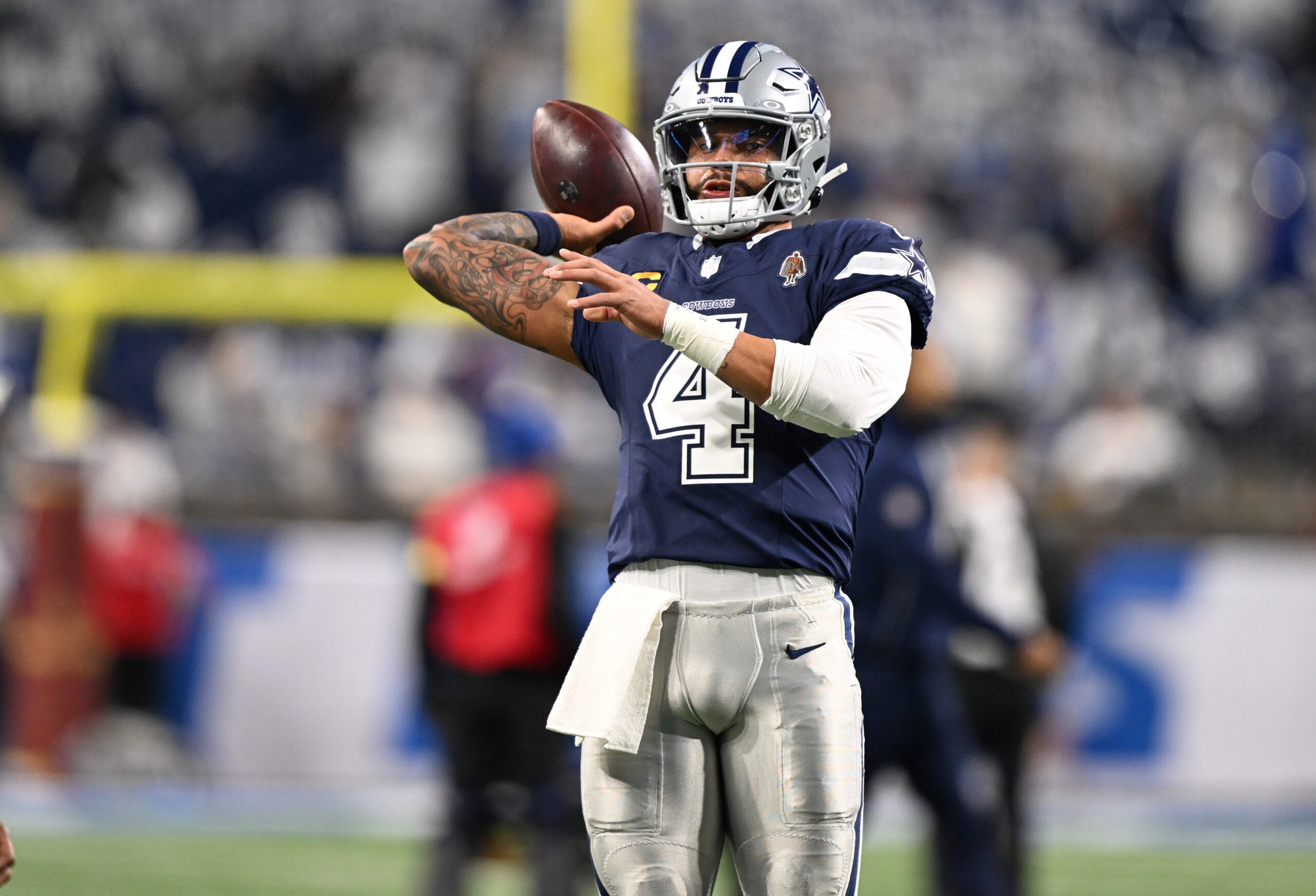 Dec 4, 2025; Detroit, Michigan, USA; Dallas Cowboys quarterback Dak Prescott (4) warms up before a game against the Detroit Lions at Ford Field.