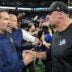 Detroit Lions head coach Dan Campbell shakes hands with Dallas Cowboys head coach Brian Schottenheimer after 44-30 win at Ford Field in Detroit on Thursday, Dec. 4, 2025.