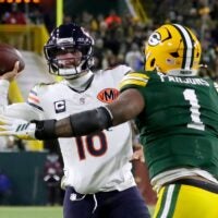 Green Bay Packers defensive end Micah Parsons (1) pressures Chicago Bears quarterback Caleb Williams (18) on Sunday, December 7, 2025, at Lambeau Field in Green Bay, Wis. The Packers defeated the Bears 28-21.