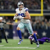 Dec 14, 2025; Arlington, Texas, USA; Dallas Cowboys tight end Luke Schoonmaker (86) runs after a catch during the second half against the Minnesota Vikings at AT&T Stadium.