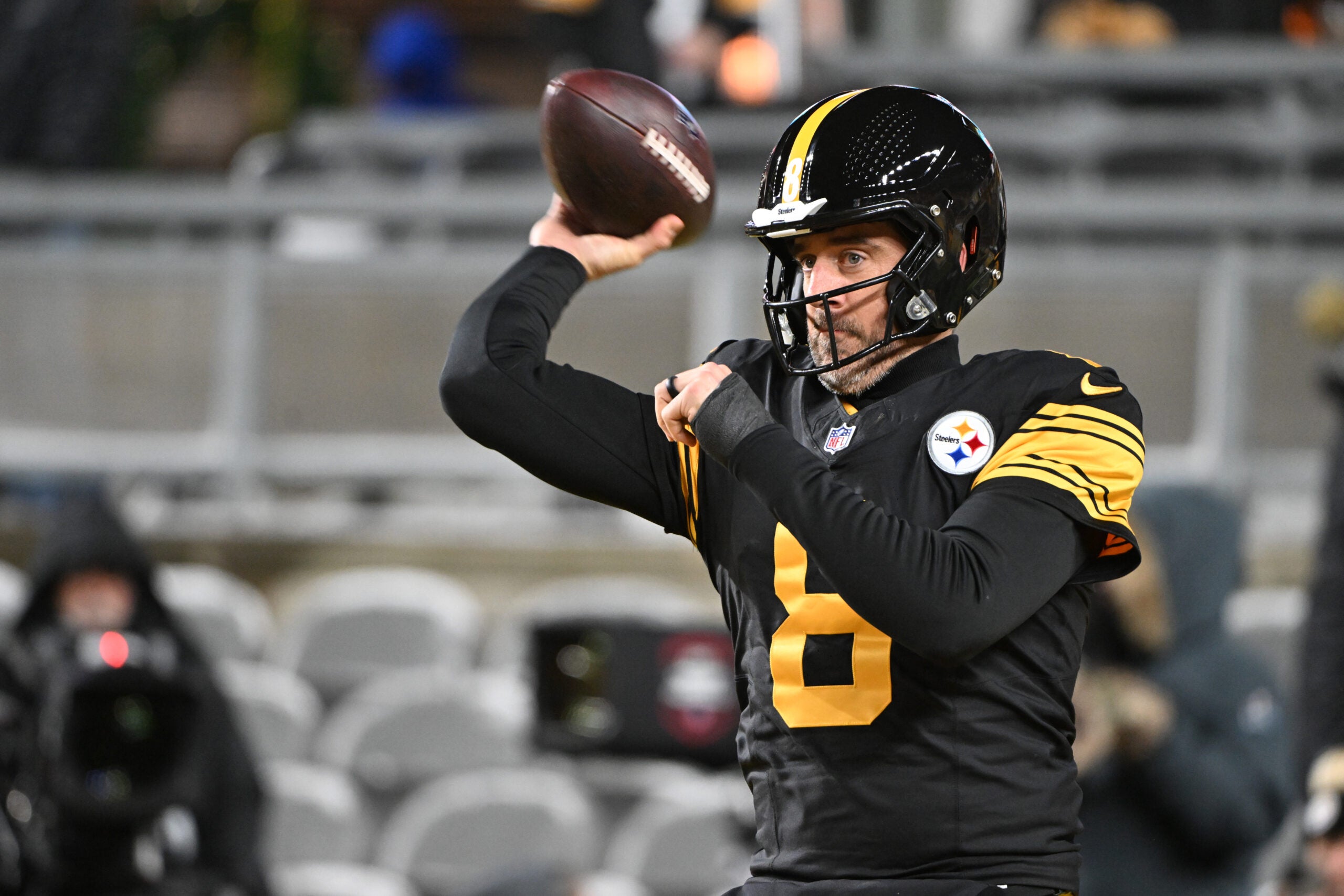 Dec 15, 2025; Pittsburgh, Pennsylvania, USA; Pittsburgh Steelers quarterback Aaron Rodgers (8) warms up before the game against the Miami Dolphins at Acrisure Stadium.