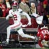 Dec 19, 2025; Norman, OK, USA; Alabama Crimson Tide defensive back Zabien Brown (2) eludes a tackle by Oklahoma Sooners quarterback John Mateer (10) in the first half at Gaylord Family OK Memorial Stadium.